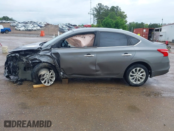 2019 Nissan Sentra S z VIN 3N1AB7AP7KY364754, wystawiony jako IAAI lot #42056332 z przebiegiem 170 068 mil mil oraz . Historia ofert i sprzedaży dostępna na DreamBid. Obrazek 14.