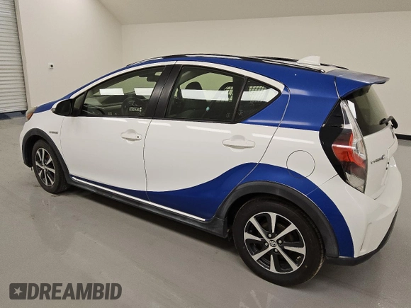 2018 Toyota Prius One z VIN JTDKDTB39J1600002, wystawiony jako Copart lot #53493975 z przebiegiem 87 147 mil mil oraz Czysty tytuł • Clean title. Historia ofert i sprzedaży dostępna na DreamBid. Obrazek 2.