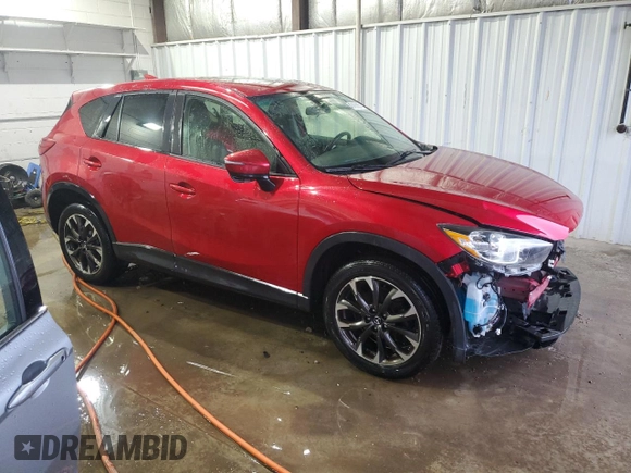 2016 Mazda CX-5 Grand Touring with VIN JM3KE4DY6G0714766, listed as a Copart auction lot 47468885 with 146,696 mi miles and Salvage Title. Bid and sale history available at carsss.com. Image 4.
