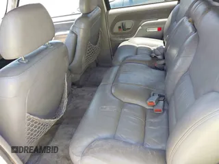 1996 Chevrolet Tahoe z VIN 1GNEK13R9TJ357134, wystawiony jako IAAI lot #42218520 z przebiegiem 213 135 mil mil oraz . Historia ofert i sprzedaży dostępna na DreamBid. Obrazek 8.