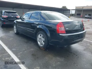 2006 Chrysler 300 C with VIN 2C3LK63H66H142437, listed as a IAAI auction lot 41751890 with 57,374 mi miles. Bid and sale history available at carsss.com. Image 3.