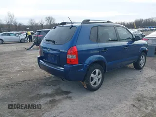 2007 Hyundai Tucson GLS with VIN KM8JM12B77U617990, listed as a IAAI auction lot 41300579 with 167,789 mi miles. Bid and sale history available at carsss.com. Image 4.