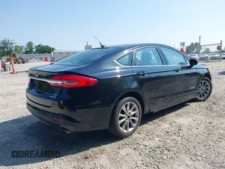 2017 Ford Fusion Hybrid SE with VIN 3FA6P0LU5HR344879, listed as a IAAI auction lot 42483771 with 146,603 mi miles and . Bid and sale history available at DreamBid. Image 4.