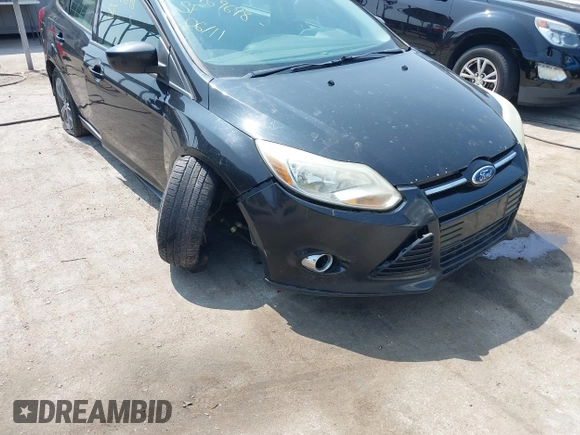 2012 Ford Focus SE with VIN 1FAHP3F28CL255965, listed as a IAAI auction lot 42469698 with 236,307 mi miles and . Bid and sale history available at DreamBid. Image 6.