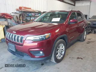 2019 Jeep Cherokee Latitude z VIN 1C4PJMCB7KD127453, wystawiony jako IAAI lot #42100924 z przebiegiem 97 414 mil mil oraz . Historia ofert i sprzedaży dostępna na DreamBid. Obrazek 19.