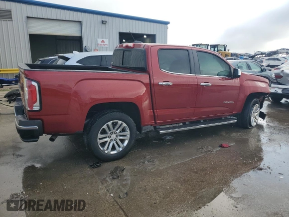 2016 GMC Canyon 2WD SLT with VIN 1GTG5DE39G1176821, listed as a Copart auction lot 86958264 with 127,514 mi miles and Salvage Title. Bid and sale history available at carsss.com. Image 3.