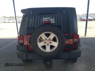 2010 Jeep Wrangler Unlimited Rubicon with VIN 1J4BA6H18AL197855, listed as a Copart auction lot 57748185 with 147,899 mi miles and Salvage title. Bid and sale history available at DreamBid. Image 6.