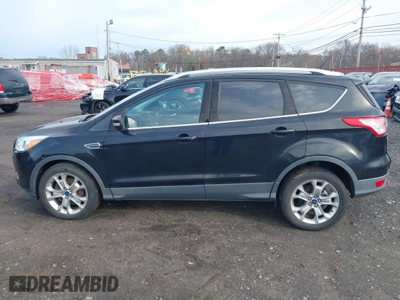 2014 Ford Escape Titanium with VIN 1FMCU9J98EUD73818, listed as a IAAI auction lot 42036442 with 129,794 mi miles. Bid and sale history available at carsss.com. Image 14.