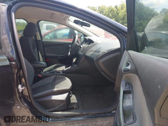 2013 Ford Focus SE z VIN 1FADP3F25DL262680, wystawiony jako IAAI lot #42682392 z przebiegiem 198 878 mil mil oraz . Historia ofert i sprzedaży dostępna na DreamBid. Obrazek 5.