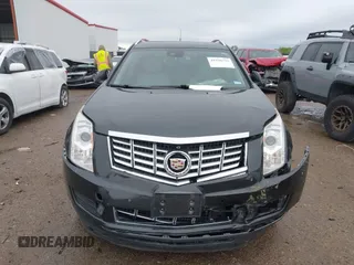 2014 Cadillac SRX Luxury Collection with VIN 3GYFNBE31ES591962, listed as a IAAI auction lot 41948735 with 97,523 mi miles and . Bid and sale history available at carsss.com. Image 12.