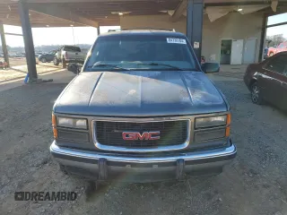 1999 GMC Yukon with VIN 1GKEK13R3XJ750307, listed as a Copart auction lot 84728104 with 212,879 mi miles and Salvage Title. Bid and sale history available at carsss.com. Image 5.