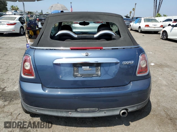 2010 MINI Convertible with VIN WMWMR3C51ATU97217, listed as a Copart auction lot 67732714 with 127,880 mi miles and Clean Title. Bid and sale history available at DreamBid. Image 6.