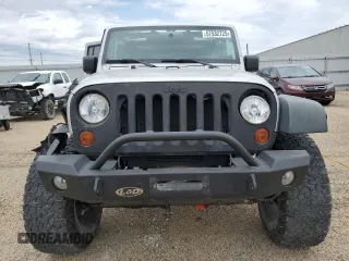 2011 Jeep Wrangler Unlimited Rubicon with VIN 1J4BA6H13BL537964, listed as a Copart auction lot 57532725 with 71,498 mi miles and Salvage title. Bid and sale history available at DreamBid. Image 5.