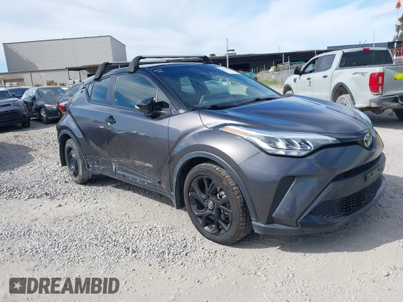 2021 Toyota C-HR LE with VIN JTNKHMBX1M1120212, listed as a IAAI auction lot 41975849 with 62,228 mi miles. Bid and sale history available at carsss.com. Image 1.