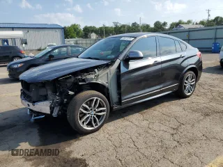 2018 BMW X4 M40i with VIN 5UXXW7C55J0W64498, listed as a Copart auction lot 58873794 with 144,148 mi miles and Salvage Title. Bid and sale history available at carsss.com. Image 1.