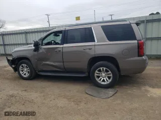 2017 Chevrolet Tahoe LS with VIN 1GNSCAKC2HR192453, listed as a Copart auction lot 45001995 with 214,091 mi miles and Salvage Title. Bid and sale history available at carsss.com. Image 2.