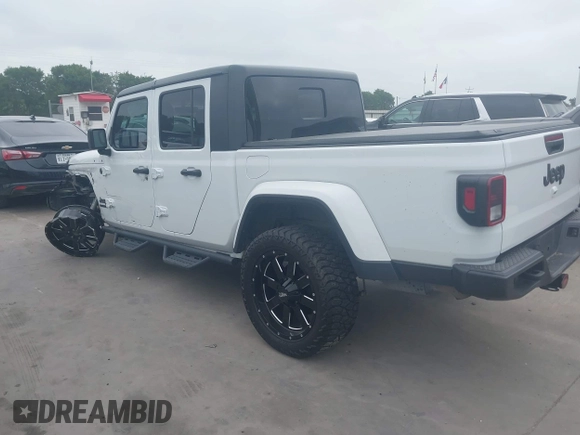 2021 Jeep Gladiator 80th Anniversary с VIN 1C6HJTAG4ML514295, выставлен на аукционе IAAI как лот 42083130 с пробегом 53 547 миль миль и . История ставок и продаж доступна на DreamBid. Изображение 3.