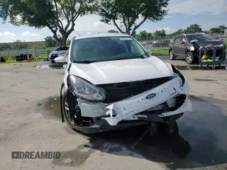 2021 Ford Escape SE with VIN 1FMCU0G66MUA33509, listed as a Copart auction lot 63328815 with 67,219 mi miles and Salvage title. Bid and sale history available at DreamBid. Image 14.