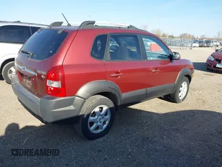 2005 Hyundai Tucson GLS with VIN KM8JN12D85U087248, listed as a IAAI auction lot 42034749 with 209,199 mi miles. Bid and sale history available at carsss.com. Image 4.