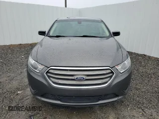 2018 Ford Taurus SE z VIN 1FAHP2D88JG129449, wystawiony jako Copart lot #56127615 z przebiegiem 127 589 mil mil oraz Czysty tytuł • Clean title. Historia ofert i sprzedaży dostępna na DreamBid. Obrazek 5.