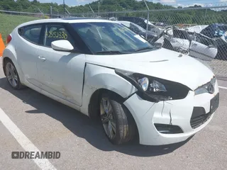 2013 Hyundai Veloster w/Gray Int with VIN KMHTC6AD6DU091813, listed as a IAAI auction lot 42552338 with 115,755 mi miles and . Bid and sale history available at DreamBid. Image 1.