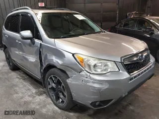 2015 Subaru Forester 2.5i Touring with VIN JF2SJAUC8FH468456, listed as a IAAI auction lot 41132284 with 188,408 mi miles. Bid and sale history available at carsss.com. Image 1.