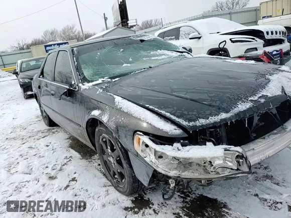 2002 Cadillac Seville Touring STS z VIN 1G6KY549X2U177791, wystawiony jako Copart lot #89313345 z przebiegiem 171 707 mil mil oraz Szkoda całkowita • Salvage title. Historia ofert i sprzedaży dostępna na DreamBid. Obrazek 11.