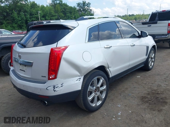 2014 Cadillac SRX Performance Collection with VIN 3GYFNFE34ES677712, listed as a IAAI auction lot 42668059 with 150,135 mi miles and . Bid and sale history available at DreamBid. Image 4.