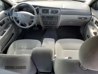2003 Ford Taurus SE с VIN 1FAHP53233G244946, выставлен на аукционе Copart как лот 61238665 с пробегом 62 315 миль миль и Чистый • Clean title. История ставок и продаж доступна на DreamBid. Изображение 8.