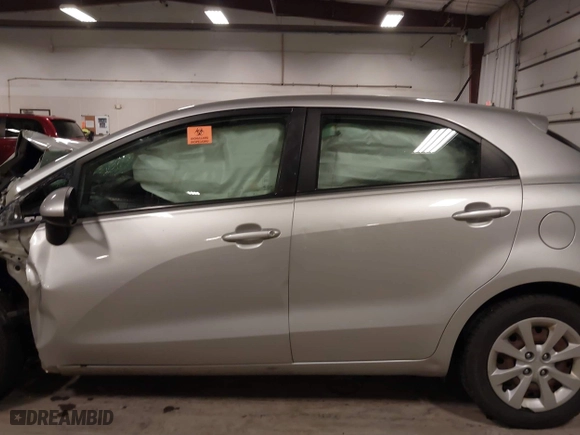 2013 Kia Rio LX with VIN KNADM5A31D6274318, listed as a IAAI auction lot 40986091 with 182,000 mi miles. Bid and sale history available at carsss.com. Image 14.