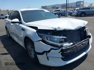 2016 Kia Optima LX with VIN 5XXGT4L37GG121295, listed as a IAAI auction lot 41922348 with 82,238 mi miles. Bid and sale history available at carsss.com. Image 1.
