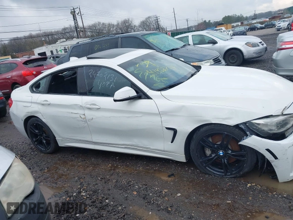 2016 BMW 4 Series 428i xDrive with VIN WBA4C9C57GG141554, listed as a IAAI auction lot 41988753 with Not Provided miles. Bid and sale history available at carsss.com. Image 12.