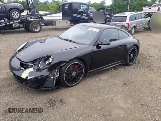 2012 Porsche 911 991 Carrera S z VIN WP0AB2A98CS721148, wystawiony jako Copart lot #65543453 z przebiegiem 52 237 mil mil oraz Szkoda całkowita • Salvage title. Historia ofert i sprzedaży dostępna na DreamBid. Obrazek 1.
