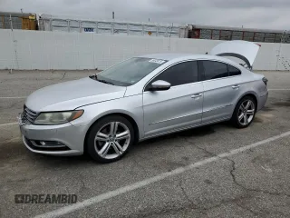 2013 Volkswagen CC Sport z VIN WVWBP7AN3DE506129, wystawiony jako Copart lot #55643815 z przebiegiem 144 080 mil mil oraz Szkody całkowita. Historia ofert i sprzedaży dostępna na DreamBid. Obrazek 1.