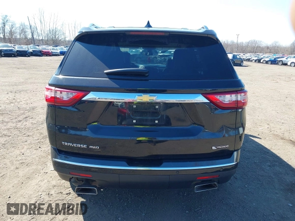 2018 Chevrolet Traverse Premier with VIN 1GNEVJKW8JJ159561, listed as a IAAI auction lot 41774914 with 132,598 mi miles and . Bid and sale history available at DreamBid. Image 16.