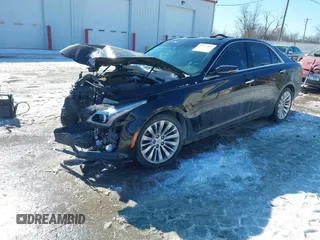 2014 Cadillac CTS Luxury AWD with VIN 1G6AX5SX3E0191673, listed as a IAAI auction lot 41617087 with 68,581 mi miles and . Bid and sale history available at DreamBid. Image 17.