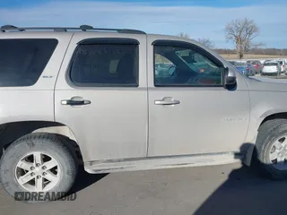 2009 GMC Yukon SLT w/4SA with VIN 1GKFK33039J117245, listed as a IAAI auction lot 41421302 with 199,864 mi miles. Bid and sale history available at carsss.com. Image 13.