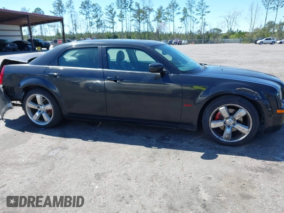 2005 Chrysler 300 with VIN 2C3AA63HX5H649107, listed as a IAAI auction lot 41748562 with 173,803 mi miles. Bid and sale history available at carsss.com. Image 13.
