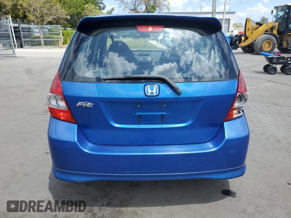 2007 Honda Fit Sport with VIN JHMGD38687S014318, listed as a Copart auction lot 53992935 with 59,504 mi miles and Clean title. Bid and sale history available at DreamBid. Image 6.