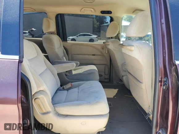 2010 Honda Odyssey LX z VIN 5FNRL3H25AB004652, wystawiony jako Copart lot #54923025 z przebiegiem 335 312 mil mil oraz Szkoda całkowita • Salvage title. Historia ofert i sprzedaży dostępna na DreamBid. Obrazek 11.