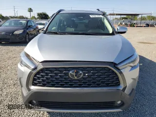 2024 Toyota Corolla Cross XLE z VIN 7MUDAABG9RV101729, wystawiony jako Copart lot #57681495 z przebiegiem 5 870 mil mil oraz Szkoda całkowita • Salvage title. Historia ofert i sprzedaży dostępna na DreamBid. Obrazek 5.