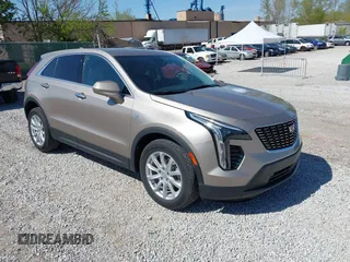 2023 Cadillac XT4 FWD Luxury z VIN 1GYAZAR42PF109650, wystawiony jako IAAI lot #41921489 z przebiegiem 23 530 mil mil oraz . Historia ofert i sprzedaży dostępna na DreamBid. Obrazek 1.