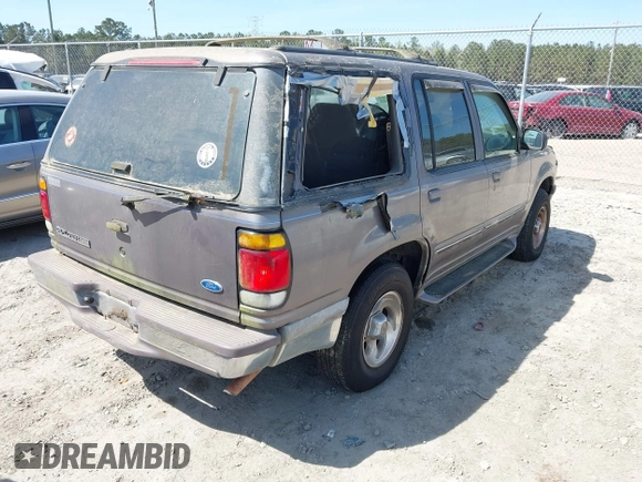 1996 Ford Explorer XL z VIN 1FMDU34XXTUD00720, wystawiony jako IAAI lot #41881522 z przebiegiem 156 194 mil mil oraz . Historia ofert i sprzedaży dostępna na DreamBid. Obrazek 4.