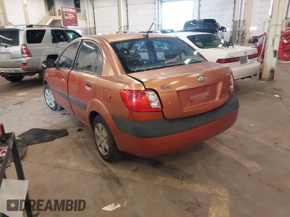 2009 Kia Rio LX with VIN KNADE223796547229, listed as a IAAI auction lot 41947371 with 153,061 mi miles and . Bid and sale history available at DreamBid. Image 3.