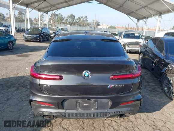 2019 BMW X4 M40i z VIN 5UXUJ5C54KLJ64077, wystawiony jako IAAI lot #41012233 z przebiegiem 40 737 mil mil oraz . Historia ofert i sprzedaży dostępna na DreamBid. Obrazek 15.