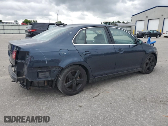 2009 Volkswagen Jetta SE with VIN 3VWRZ71K59M055735, listed as a Copart auction lot 60202485 with 160,196 mi miles and Salvage title. Bid and sale history available at DreamBid. Image 3.