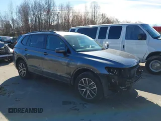 2021 Volkswagen Tiguan S with VIN 3VV1B7AX1MM044788, listed as a IAAI auction lot 41678069 with 91,665 mi miles and . Bid and sale history available at DreamBid. Image 1.