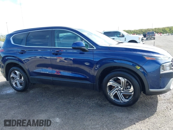 2022 Hyundai Santa Fe SE with VIN 5NMS14AJ6NH449145, listed as a IAAI auction lot 40491612 with 21,488 mi miles and . Bid and sale history available at DreamBid. Image 13.