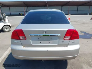 2001 Honda Civic LX with VIN 1HGES16591L002954, listed as a IAAI auction lot 42057695 with 238,849 mi miles. Bid and sale history available at carsss.com. Image 17.