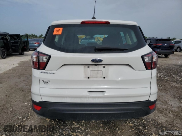 2018 Ford Escape S with VIN 1FMCU0F70JUA94439, listed as a Copart auction lot 62675905 with 211,864 mi miles and Salvage title. Bid and sale history available at DreamBid. Image 6.
